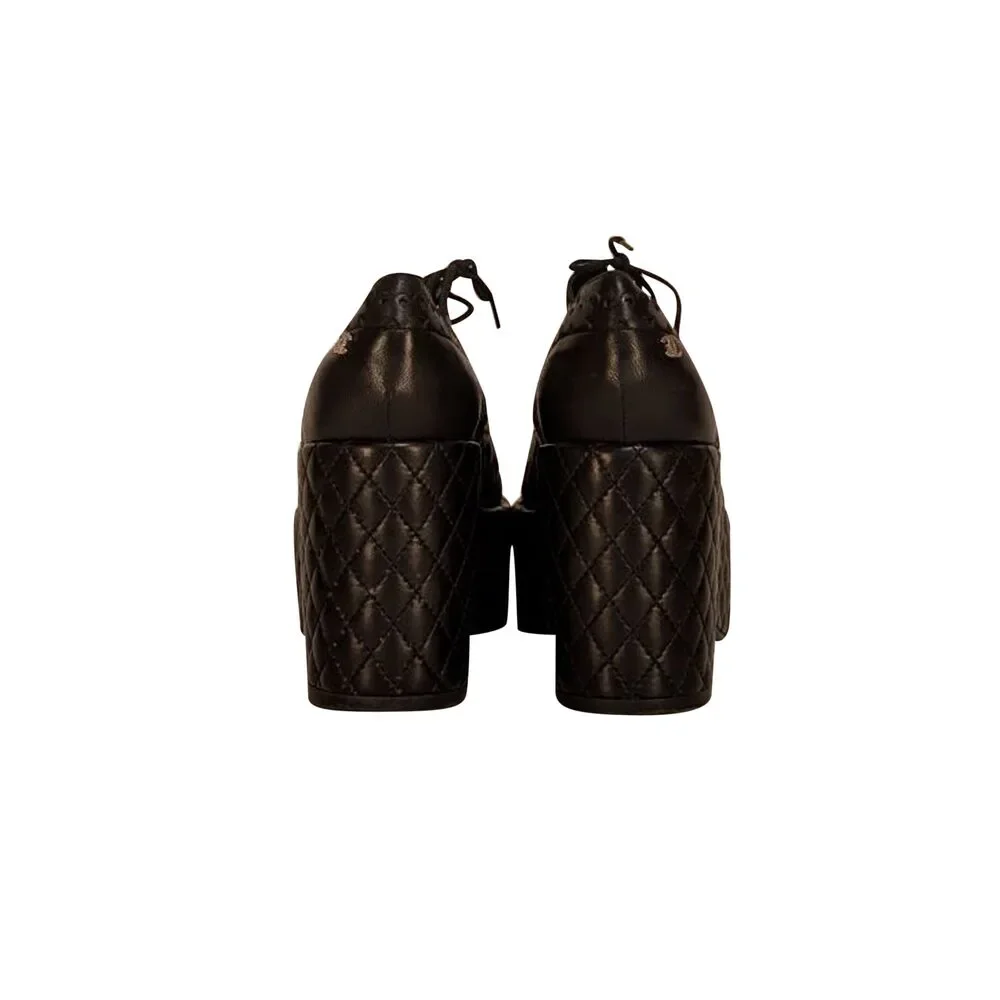 CHANEL black leather